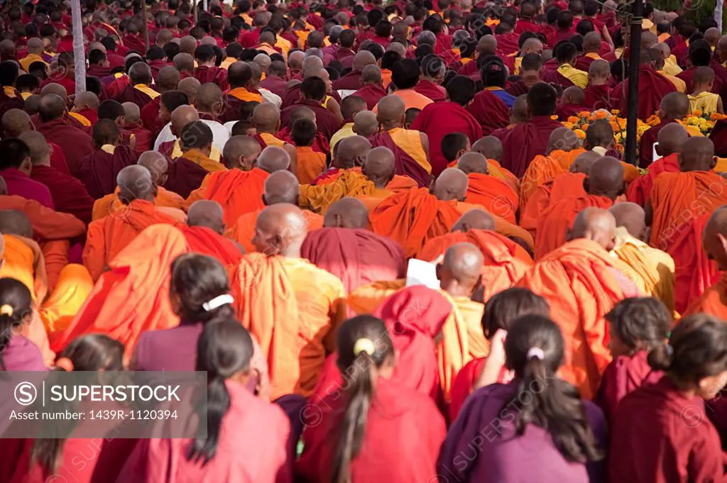Buddhist monks during prayer in lumbini nepal