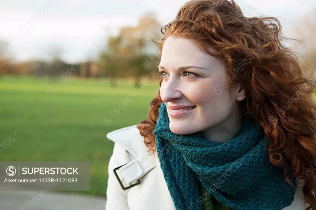 Portrait of a smiling red haired woman