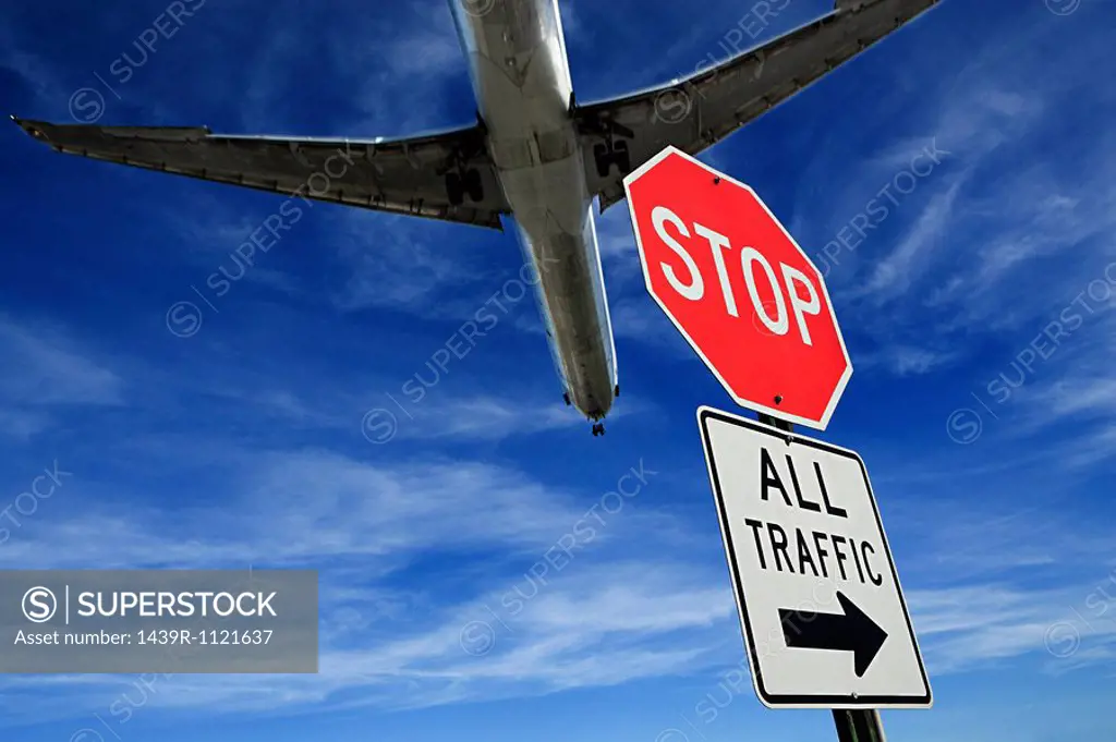 Airplane and stop sign