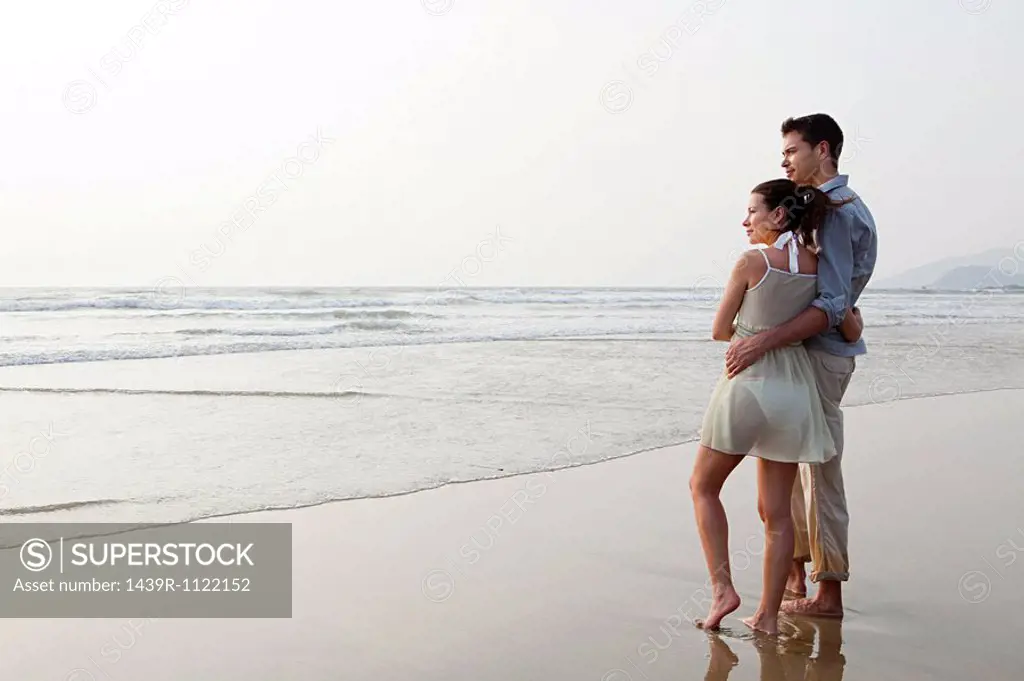 Couple looking out to the ocean