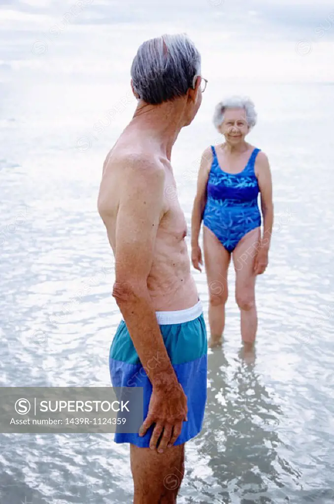 A mature couple in the water