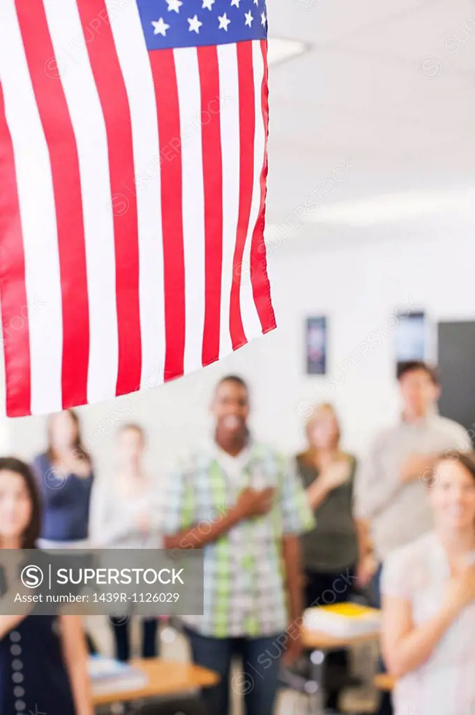 High school students swearing allegiance to the American flag