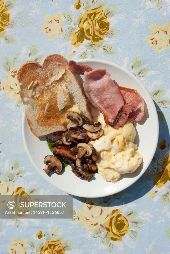 English breakfast on chintz tablecloth