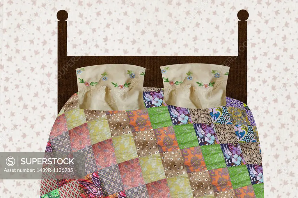 Patchwork quilt on bed