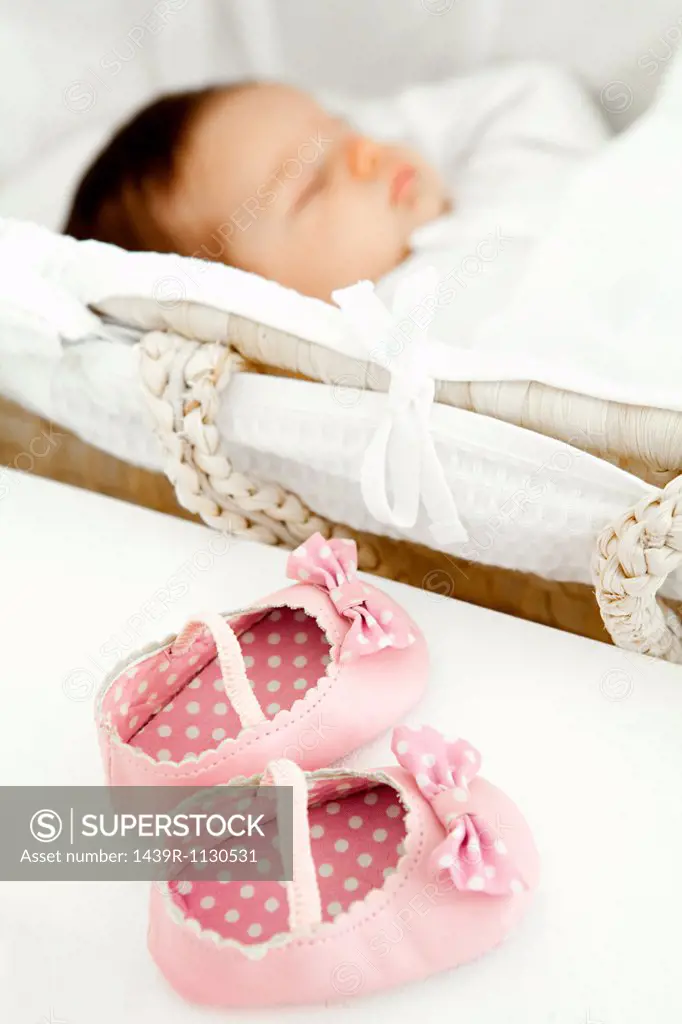 Baby girl shoes and baby sleeping