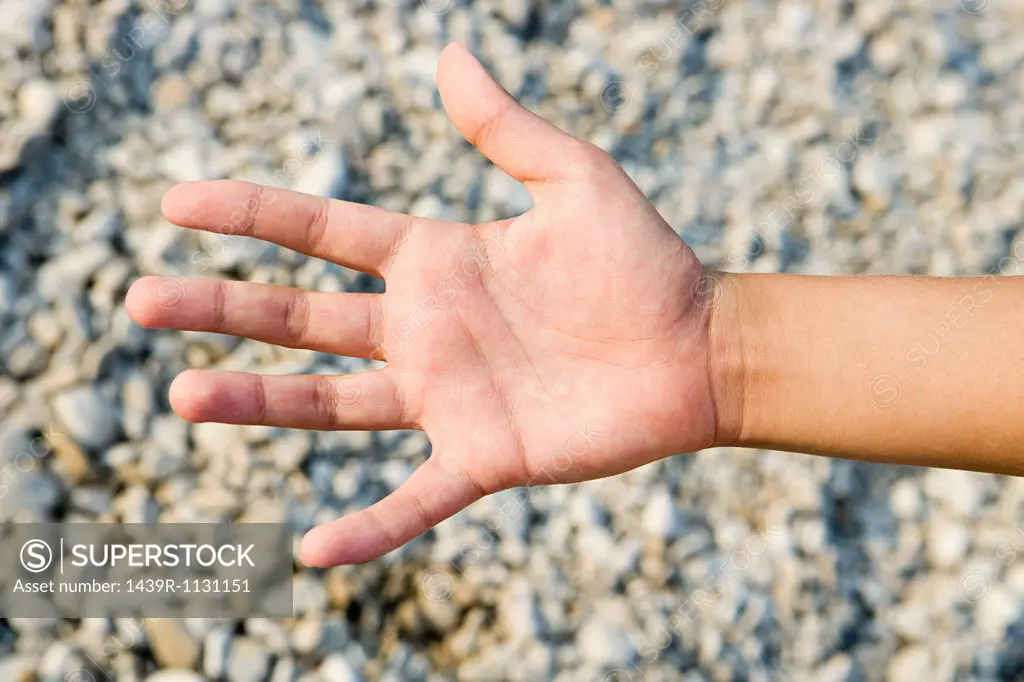 Person´s palm against textured background