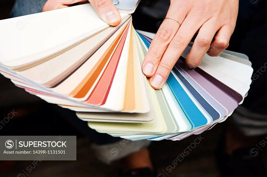Woman looking at color swatch