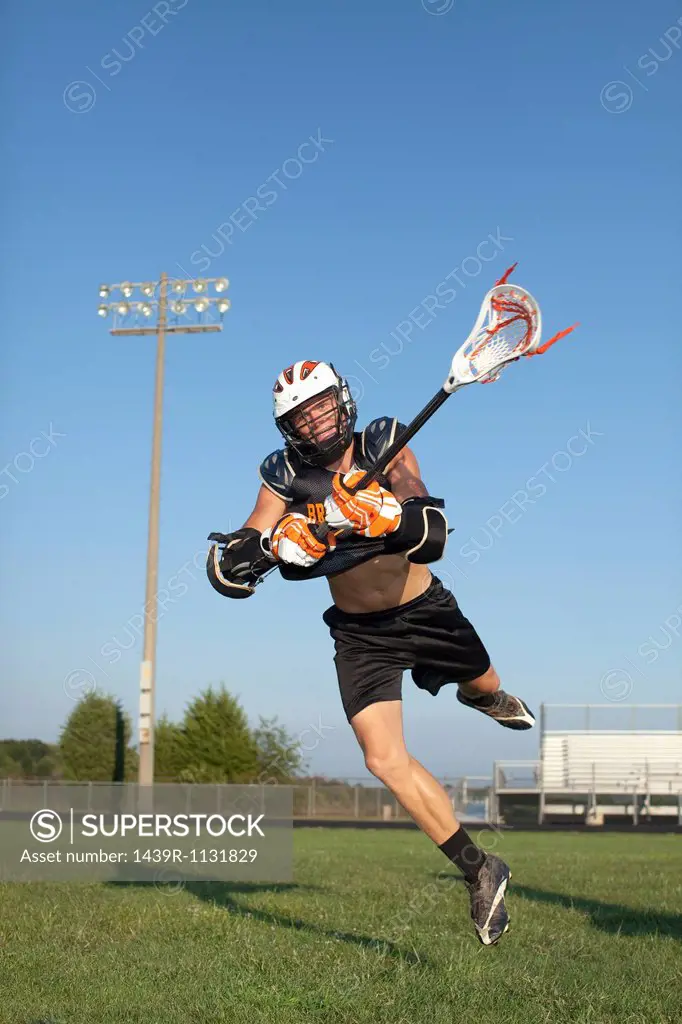 Young man playing lacrosse