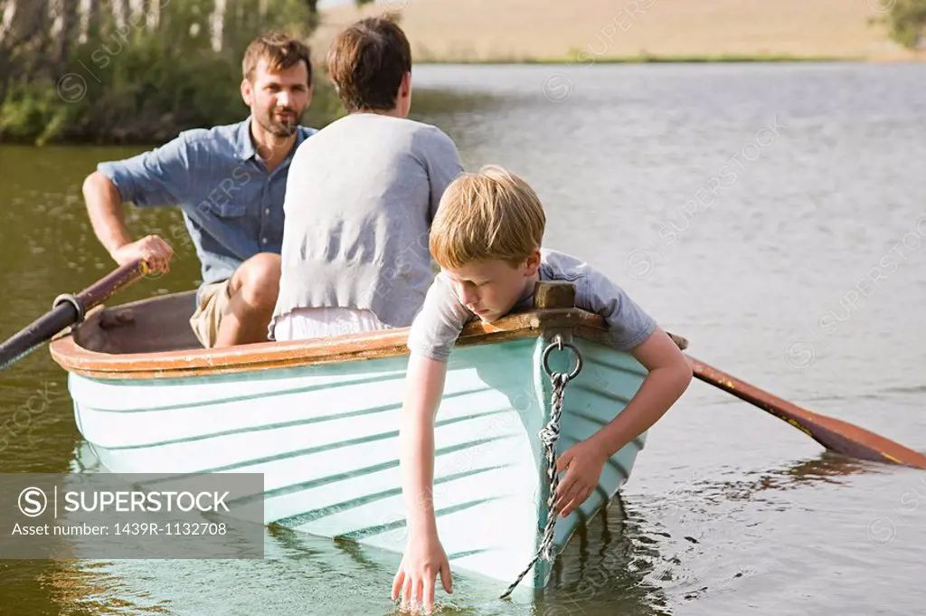 Family with rowing boat