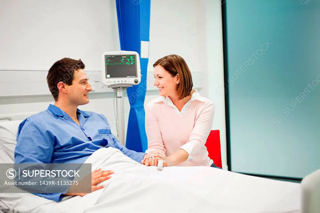 Wife visiting husband in hospital