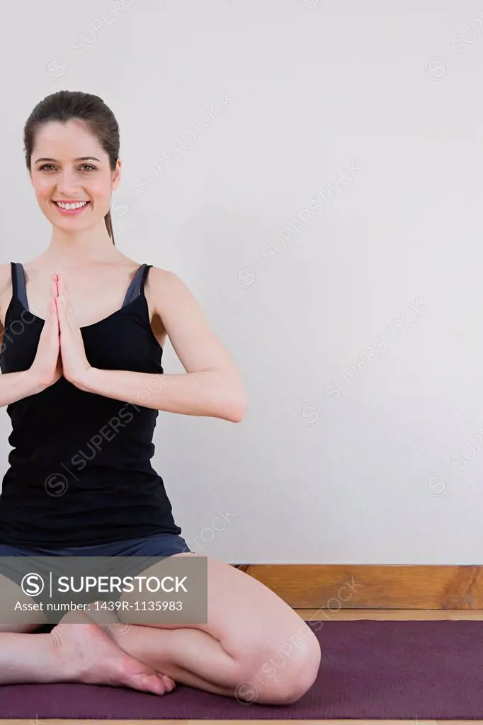 Woman in prayer position during yoga