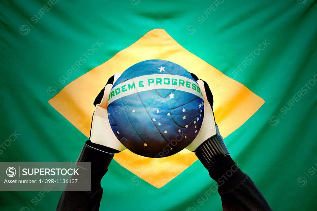 Brazilian goalkeeper holding football