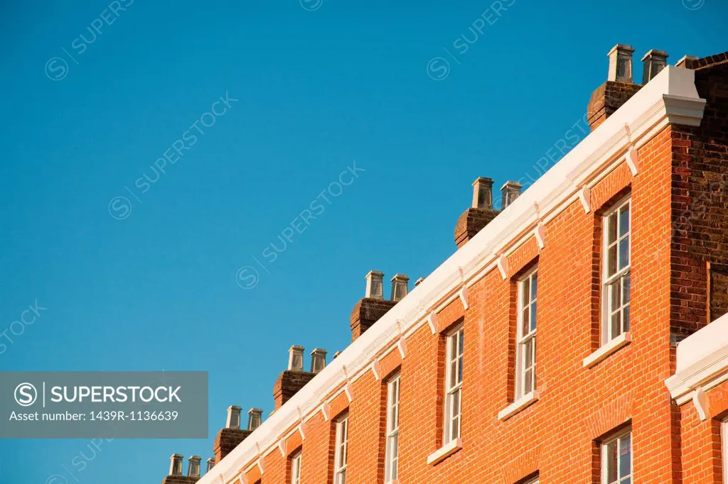 House exteriors against blue sky