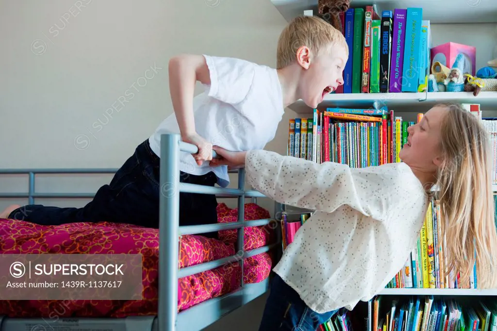 Children playing on bunkbed