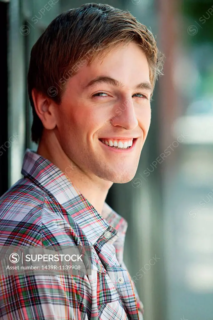 Portrait of young man smiling