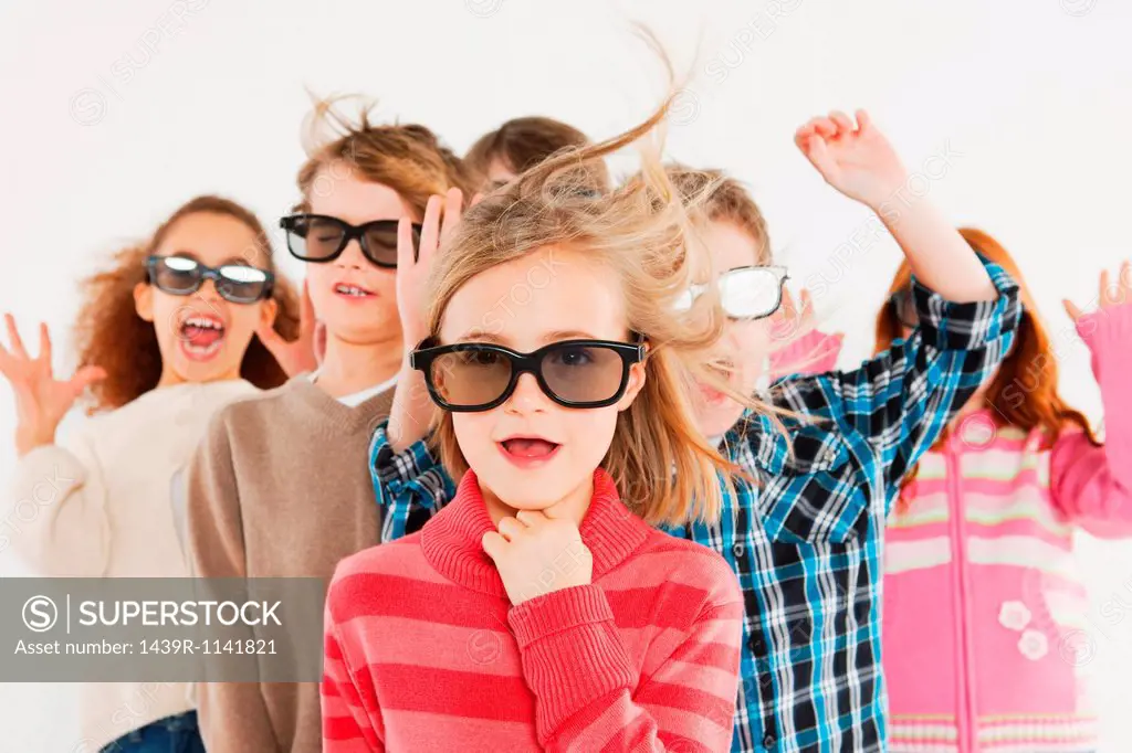 Children wearing 3D glasses