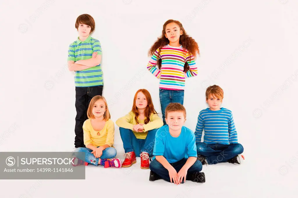 Children sitting and standing