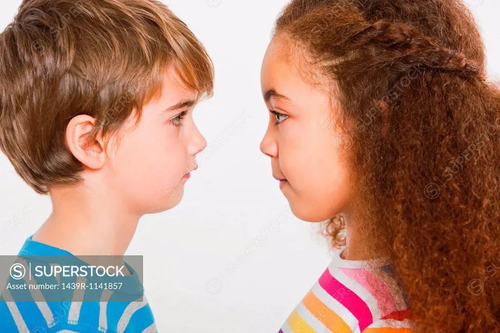 Boy and girl face to face