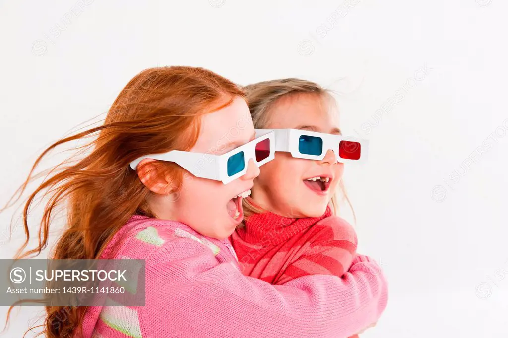 Girls wearing 3D glasses