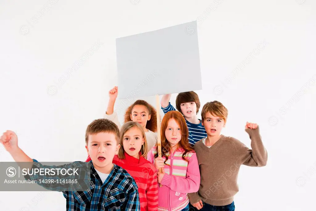 Children protesting with placard