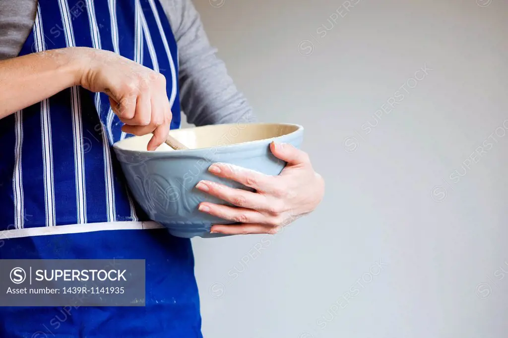 Woman with mixing bowl
