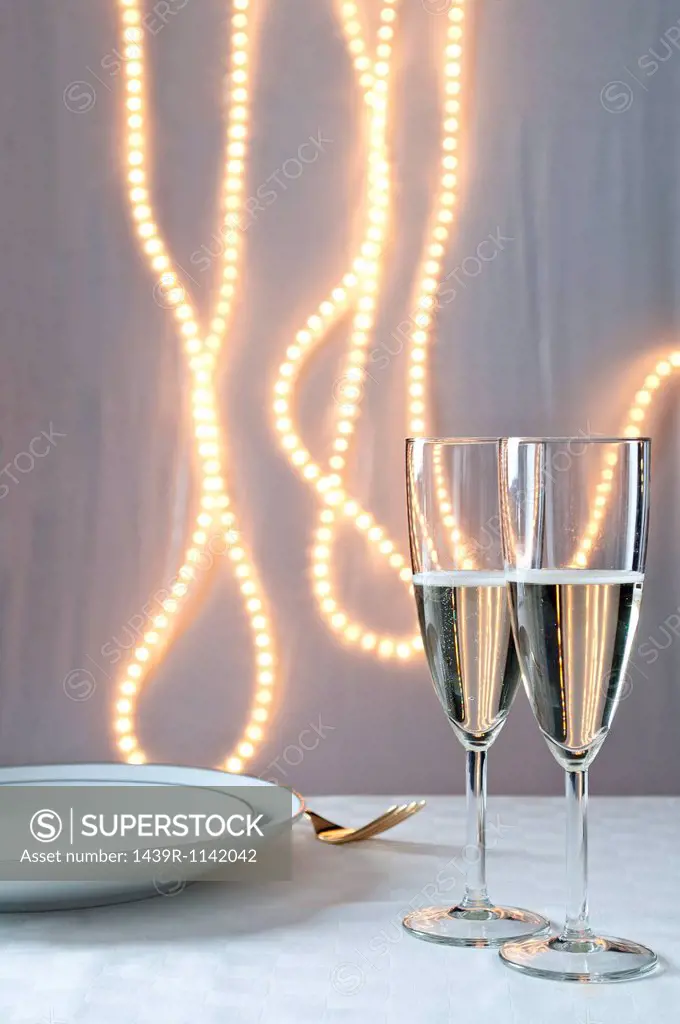 Glasses of champagne on table at an event