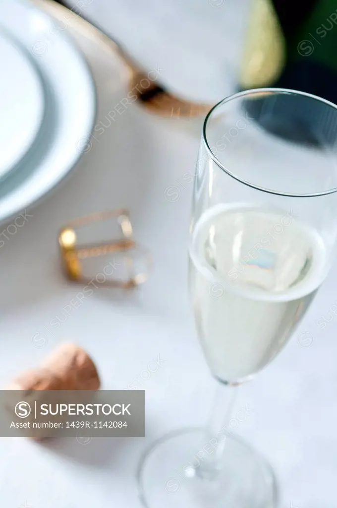 Glass of champagne on table