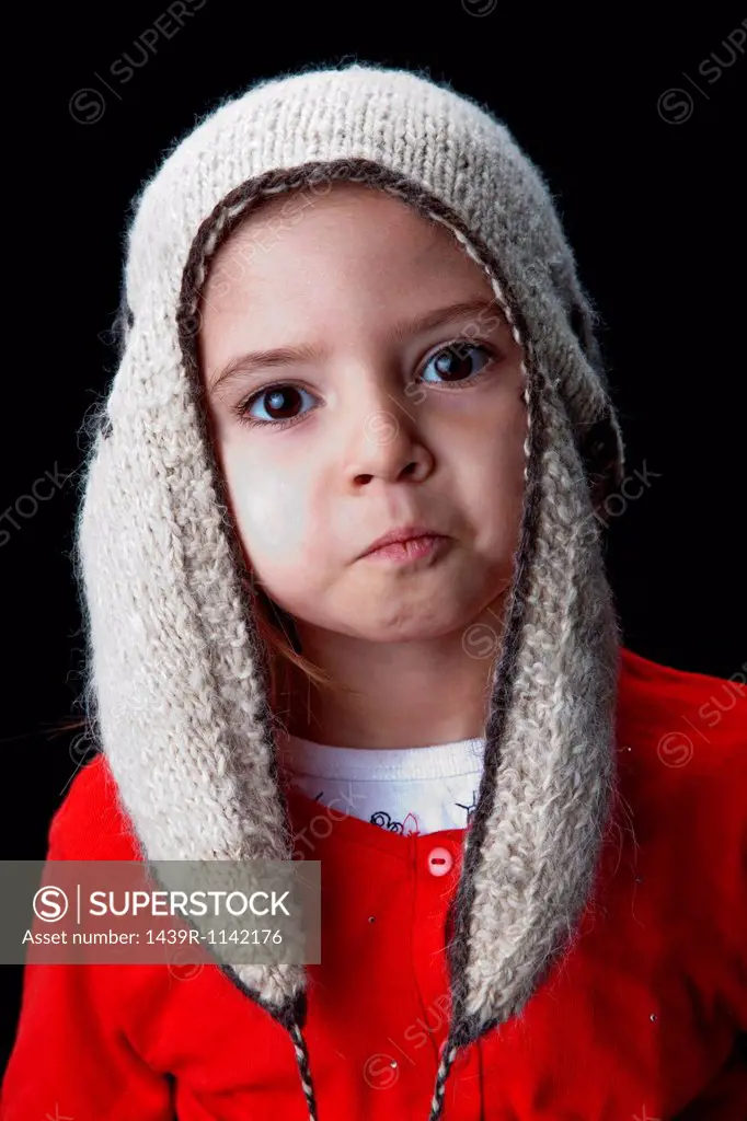 Little girl wearing a woollen hat