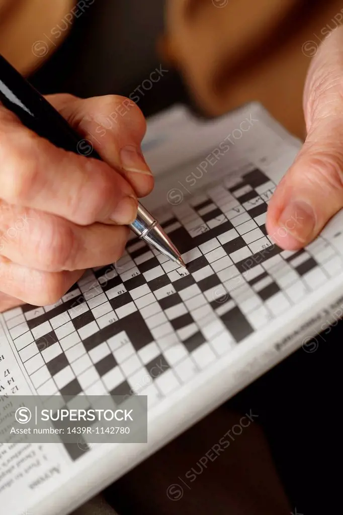 Senior woman doing crossword