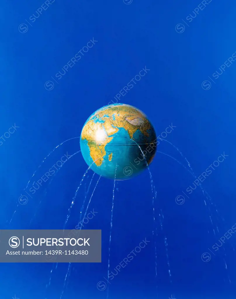 Planet earth with water leaking from it