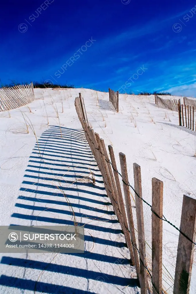 Wooden fence on beach