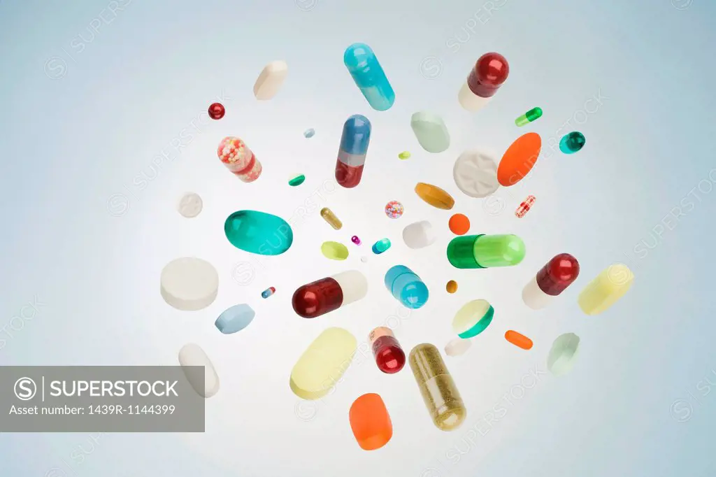 Pills, tablets and capsules in mid air