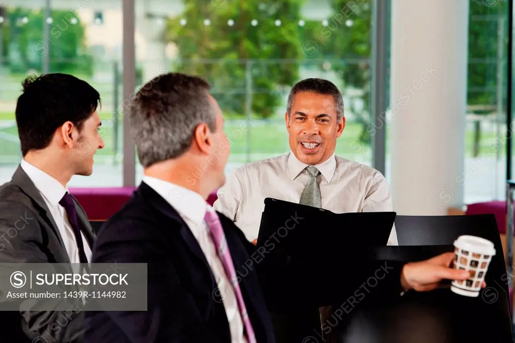 Businessmen having conversation