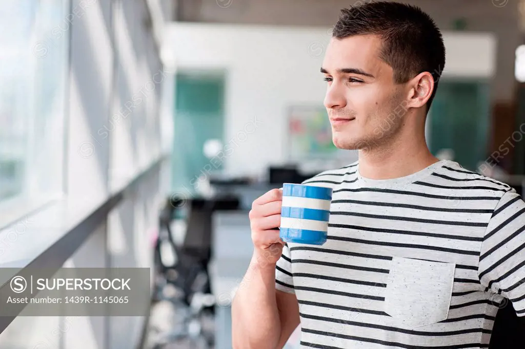Man taking coffee break