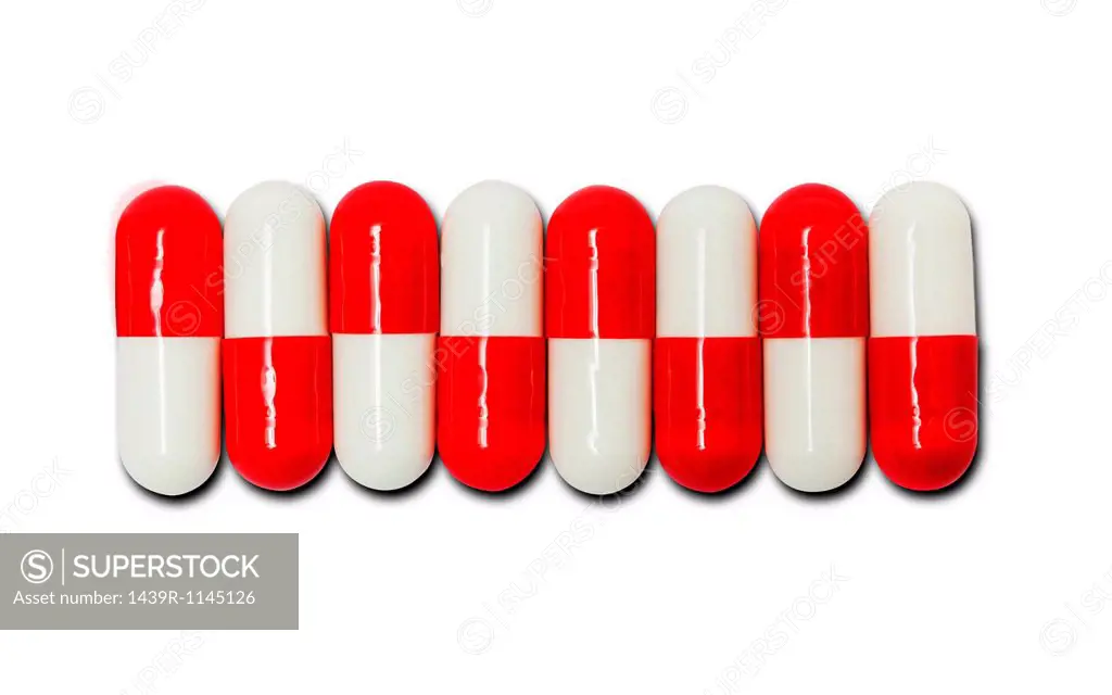 Row of red and white capsules