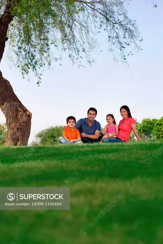 Portrait of a family in a park