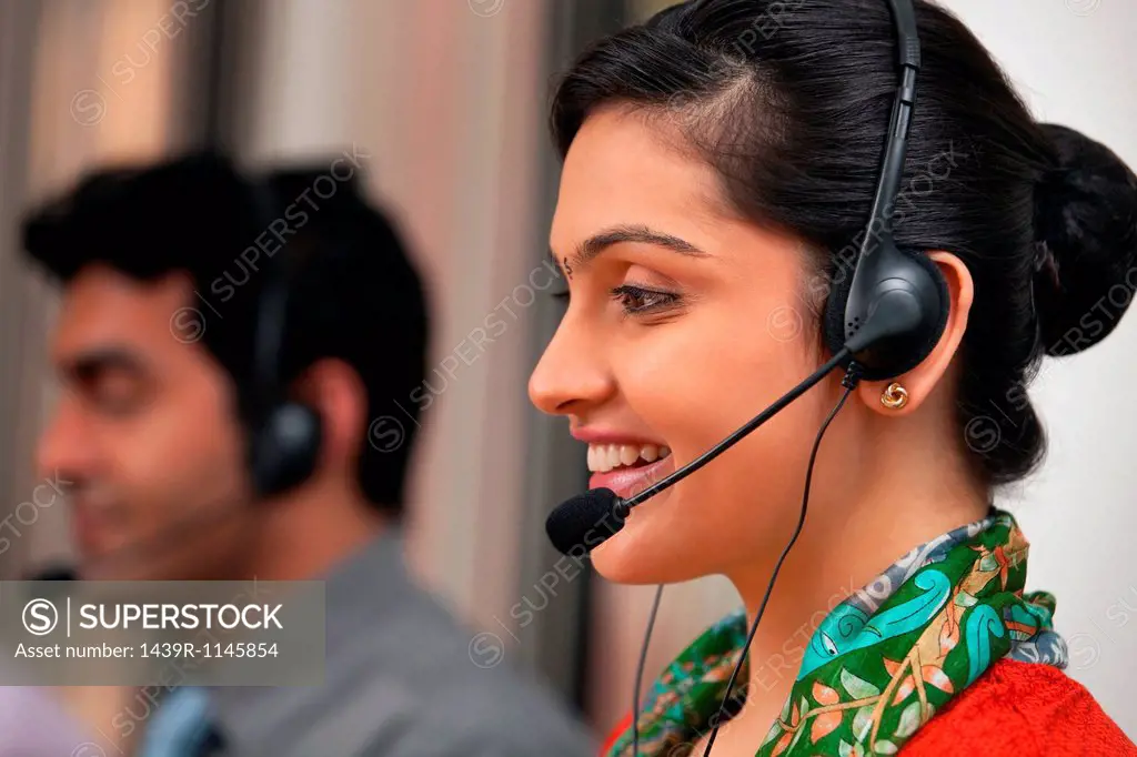 Female call center agent smiling