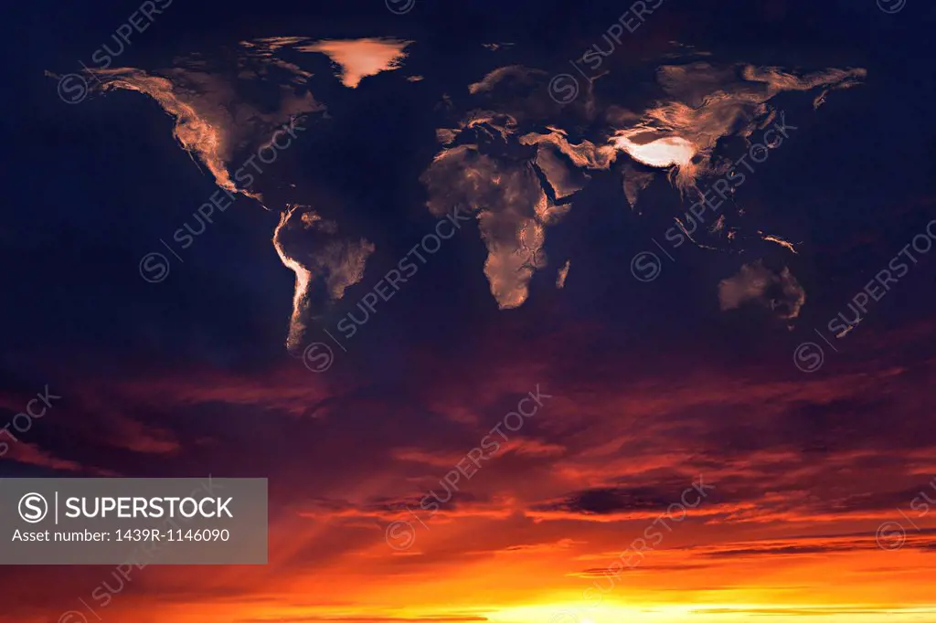 Map of the world in clouds at sunset