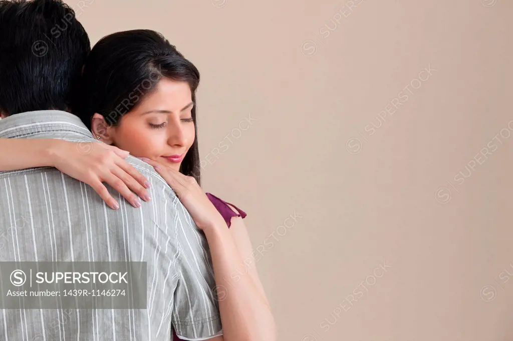 Woman hugging her husband
