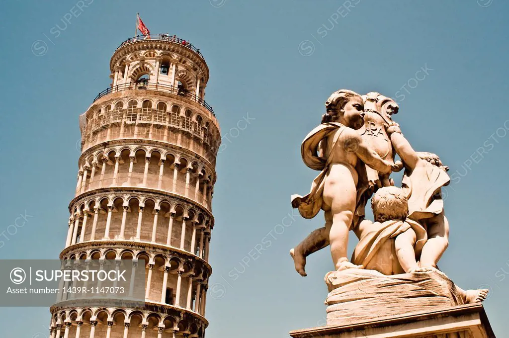 Cherub Statue and Leaning Tower Of Pisa, Pisa, Tuscany, Italy