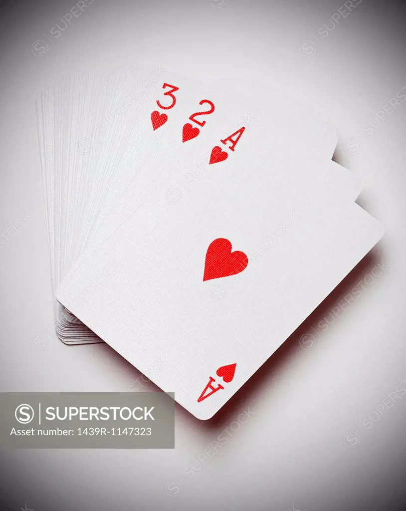 Ace, two and three of hearts