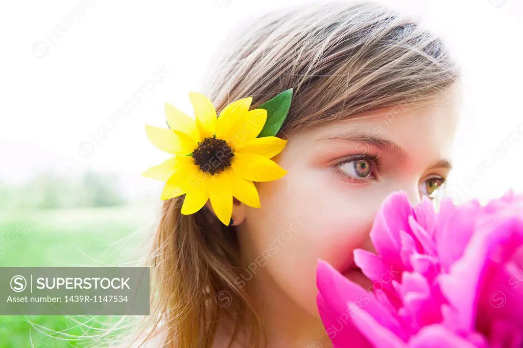 Girl with pink flower