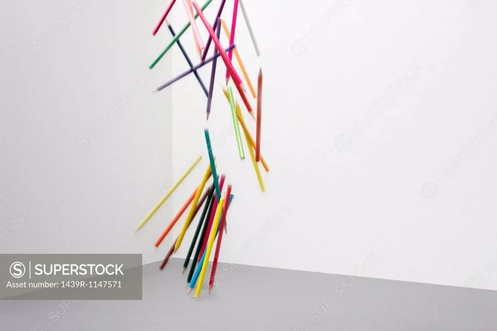 Coloured pencils falling