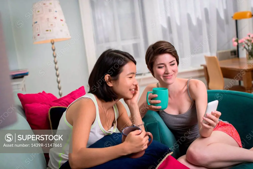 Young women looking at smartphone