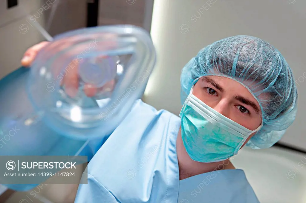 Anaesthetist with anaesthetic mask