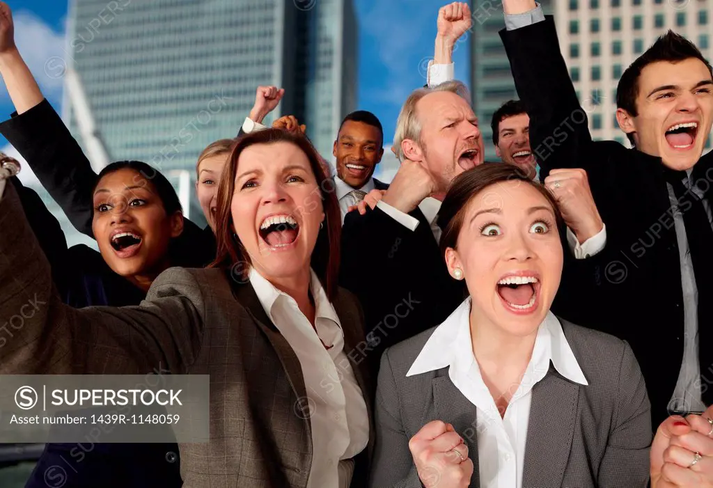 Businesspeople cheering with excitement