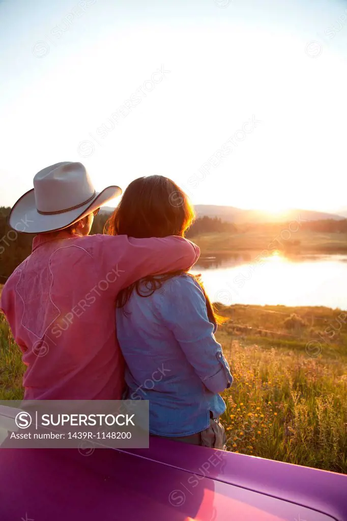 Couple looking at sunset