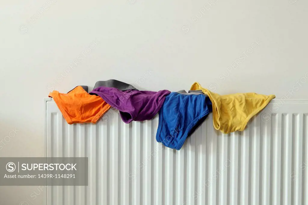 Underwear drying on radiator