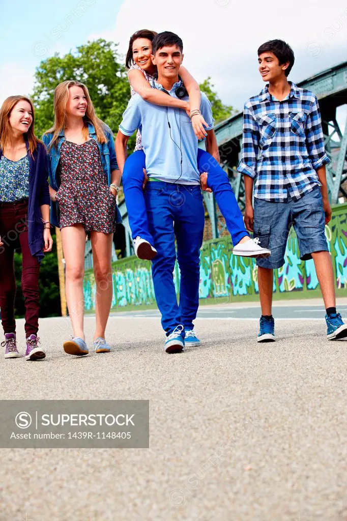 Teenage friends walking