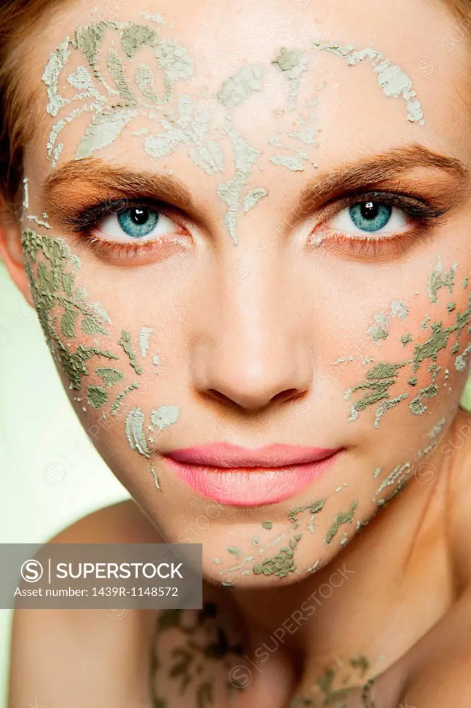 Womans face decorated with face mask